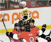  ?? PETER DIANA/PITTSBURGH POST-GAZZETTE VIA AP ?? The Senators celebrate a goal against the Penguins Wednesday during the first period of Game 3 of the Stanley Cup Playoff Eastern Conference finals in Ottawa, Ontario. The Senators won, 5-1 to take a 2-1 series lead.