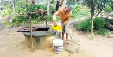  ?? Photos: Hameed Oyegbade ?? Edidion Edinyang fetches water from motorised well at Ikot-Esop village in Akwa Ibom.
