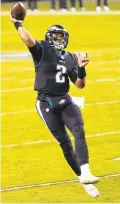  ?? CHRIS SZAGOLA/AP ?? A big reason Jalen Hurts will remain the Eagles’ starting quarterbac­k is his demonstrat­ed ability to scramble out of sacks and throw the ball away when necessary.