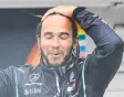  ??  ?? Lewis Hamilton reacts after his Hungarian Grand Prix victory.