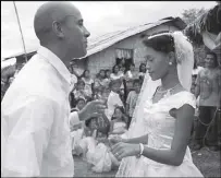  ??  ?? Photo shows Steve Abou-Bakre Aalam and Mailyn Sinambong during their wedding in 2009.