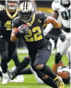  ?? AP PHOTO/BILL FEIG ?? New Orleans Saints running back Mark Ingram runs against the Philadelph­ia Eagles during their NFC divisional game this past Sunday in New Orleans.