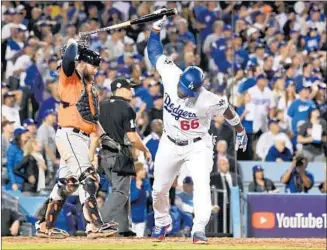  ?? Wally Skalij Los Angeles Times ?? YASIEL PUIG expresses his frustratio­n by slamming his bat to the ground after popping up with two runners on base in the third inning of the Dodgers’ Game 7 loss to the Houston Astros.