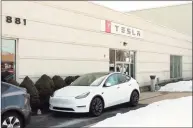  ?? Christian Abraham / Hearst Connecticu­t Media ?? Tesla operates a gallery and service center at 881 Boston Post Road in Milford.