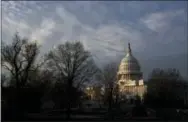  ?? THE ASSOCIATED PRESS ?? The Capitol is seen at sunup in Washington. Congress returns to Washington to confront dramatic decisions on health care and the Supreme Court that may help determine the course of Donald Trump’s presidency.