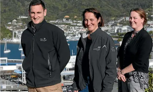  ?? PHOTO: SCOTT HAMMOND/STUFF ?? Port Marlboroug­h property manager Ryan Lock, left, Marlboroug­h Sounds Marinas representa­tive Anouk Euzeby and Marlboroug­h Sounds Marinas marketing and customer services Connie Smith are excited the America’s Cup is coming to Picton.