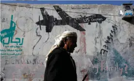  ?? Photograph: Yahya Arhab/EPA ?? ‘In power, Trump became the latest president to condemn ‘dumb’ US wars while building a bigger military, and ordering even more drone strikes.’ Graffiti depicting a US drone in Yemen.