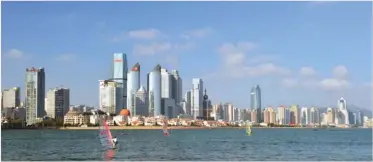  ?? PROVIDED TO CHINA DAILY ?? With a cluster of commercial zones and beautiful coastal scenery, the southern district of Qingdao attracts both entreprene­urs and surfers.