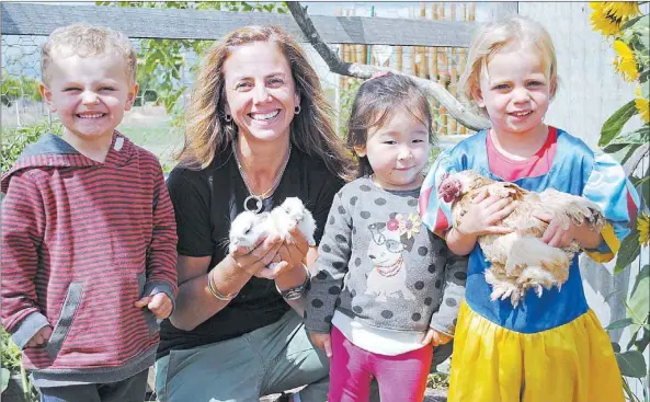  ?? PHOTO: Pam Zierk-Mahoney ?? FINALIST: Mansfield’s Kim Stoney has been named as finalist in the Rural Women’s Award for 2015. Her project “The Toolbox” is expected to be taken to more than 200 early childhood centres around the state. She is pictured at her Farmhouse Child Care...