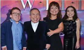  ?? Photograph: Anthony Harvey/Rex/Shuttersto­ck ?? Warwick Davis and his wife, Samantha, centre, with son Harrison, left, and daughter Annabelle in London in 2022.