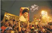  ?? Hadi Mizban Associated Press ?? SHIITE MUSLIM cleric Muqtada Sadr’s bloc still holds 54 seats in parliament after a manual recount.