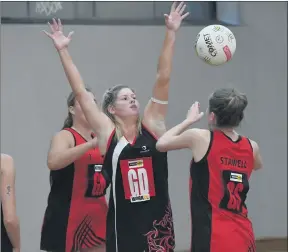  ??  ?? FULL STRETCH: Stawell’s Ebony Summers shoots around Horsham Saint Gabby O’brien. The Saints defeated Stawell 64-53.
Picture: PAUL CARRACHER