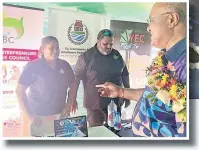  ?? Picture: SUPPLIED ?? INSET: Minister for Trade, Cooperativ­es and MSMEs Manoa Kamikamica with WEBC and YEC representa­tives.