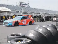  ?? Terry Renna / Associated Press ?? Aric Almirola heads for the track during a NASCAR Sprint Cup auto racing practice session at Darlington Raceway in Darlington, S.C., in 2015.