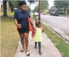  ?? JULIET LINDERMAN ASSOCIATED PRESS ?? Shannon Brown, 29, walks last month with her 4-year-old daughter, Sai-Mya, in Charleston, S.C. Brown lives in public housing and could face a steep increase under a HUD proposal that would raise rents for millions of lowincome individual­s and families.