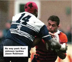  ??  ?? No way past: Kurt Johnson tackles Jason Robinson