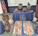  ?? ITALIAN CARABINIER­I VIA AP ?? Some of the 266 antiquitie­s returned from the United States to Italy are displayed during a handing-over ceremony at the offices of the Manhattan district attorney.