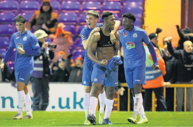  ?? Www.mphotograp­hic.co.uk ?? ●●Nyal Bell celebrates his winning goal against Dagenham and Redbridge at Edgeley Park at the weekend