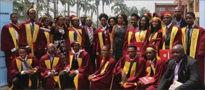  ??  ?? Some of the first class graduands with some Chevron employees