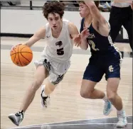  ?? TIMES photograph by Annette Beard ?? Blackhawk sophomore Bric Cates, No. 5, worked down court and popped in a short jumper in the game against the Shiloh Saints Friday, Jan. 22.