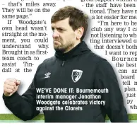  ??  ?? WE’VE DONE IT: Bournemout­h interim manager Jonathan Woodgate celebrates victory against the Clarets