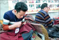  ?? PHOTOS BY LIU XIANGRUI / CHINA DAILY ?? A cooperativ­e in Khamshong township in Xigaze, Tibet autonomous region, has helped preserve the traditiona­l craftsmans­hip of wool making and in the meantime offered new hope for Tibetans to shake off poverty.