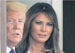  ??  ?? TURNING THE OTHER CHEEK: US President Donald Trump and First Lady Melania Trump outside of the West Wing of the White House in Washington.