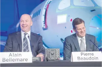  ?? RYAN REMIORZ/THE CANADIAN PRESS ?? Bombardier CEO Alain Bellemare, left, and board chairman Pierre Beaudoin saw their compensati­on spike last year, despite the aerospace company’s financial woes.