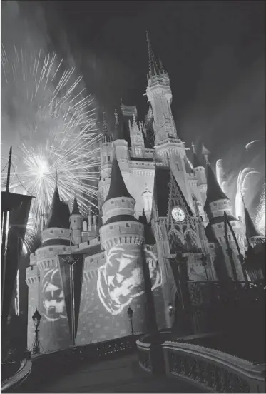  ?? THE ASSOCIATED PRESS FILES ?? Disney’s Magic Kingdom in Lake Buena Vista, Fla., offers Halloween attraction­s of a non-terrifying nature.