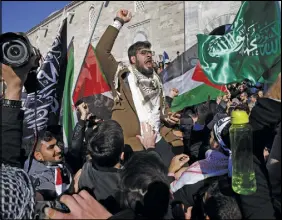  ?? Ap photo ?? Protesters chant anti-u.s. slogans as they march in the streets after Friday prayers in Istanbul.