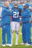  ?? BILL KOSTROUN/AP PHOTO ?? New York Giants strong safety Landon Collins is assisted by trainers after suffering a shoulder injury during the first half of Sunday’s win over the Chicago Bears at MetLife Stadium in East Rutherford, N.J. The Giants announced Wednesday that Collins will require surgery and miss the rest of the season.