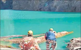  ?? PTI FILE ?? An ITBP team at the natural lake in Chamoli district.