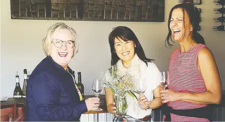  ??  ?? Lifelong friends Laurie Murdoc, left, Linda Nasu and Roula Lainas make a belated Okanagan birthday toast.