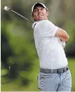  ?? ERIC GAY THE ASSOCIATED PRESS ?? Rory McIlroy hits from the 15th fairway during the first round of the Players Championsh­ip golf tournament Thursday in Ponte Vedra Beach, Fla.