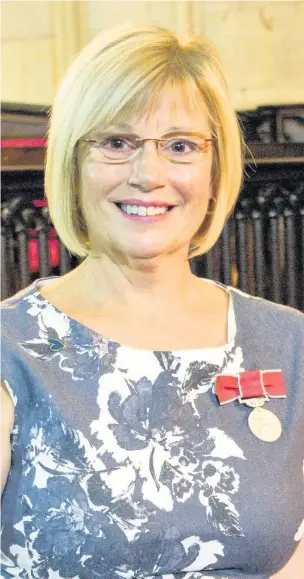  ??  ?? Anne Metcalfe with her British Empire Medal