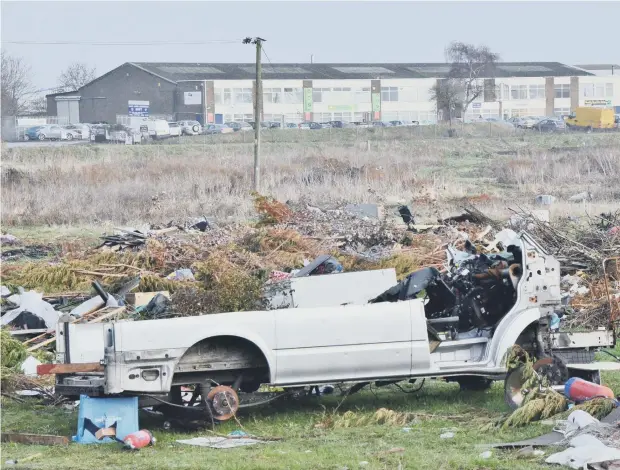  ??  ?? Land next to the Oxney Road traverller­s site covered in rubbish