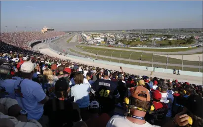  ?? Washington Post photo ?? NASCAR has had issues with race relations with fans brining Confederat­e flags to events, but now the organizati­on is trying to be more open and hoping to attract a new breed of fans.