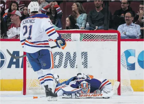  ?? Christian Petersen/Get ty Images ?? Oilers goaltender Ben Scrivens hits the deck during Wednesday’s game against the Arizona Coyotes. The Oilers lost 7-4.