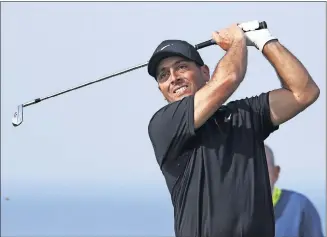  ?? [PETER MORRISON/THE ASSOCIATED PRESS] ?? Francesco Molinari plays a practice round at Royal Portrush Golf Club on Monday ahead of the British Open, which starts on Thursday.