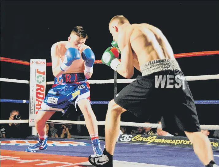  ??  ?? George Rhodes Jnr in action during his sixth-round stoppage defeat against Sheffield’s Dan West at the Energise Leisure Centre in York on Saturday Pictures by Andy Standing