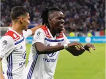  ?? – Reuters ?? CELEBRATIO­N TIME: Bertrand Traore celebrates scoring Lyon’s second goal with Houssem Aouar.