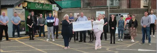  ??  ?? Orla Hore (front, left) and Margaret Brennan (front, right) with the cheque for €1,500 which they presented to the Friends of Arden House.