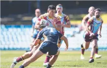  ?? Picture: GRANT TROUVILLE/NRL PHOTOS ?? David Fifita charges into the Westfields defence during yesterday’s GIO Cup final.