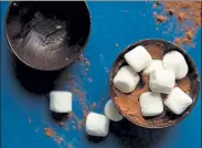  ?? THE NEW YORK TIMES ?? A few ingredient­s go a long way when it comes to hot chocolate bombs, a cozy treat that has quickly gained popularity on social media.