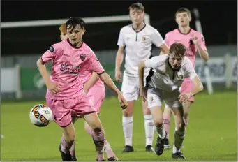  ??  ?? Rian Fitzpatric­k has time to launch an attack for Wexford F.C.