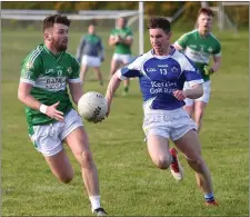  ??  ?? Legion’s Chris Davies is chased by Gearoid Savage, Kerins O’Rahilly’s, in their SFL Division One game at Dirreen on Saturday.