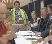  ??  ?? William Shatner greets fans and signs autographs at Phoenix Comic Fest on May 25 in Phoenix.THOMAS HAWTHORNE/THE REPUBLIC