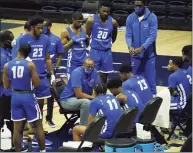  ?? David Butler II / USA Today ?? Central Connecticu­t State coach Donyell Marshall talks to his team during a timeout against UConn in a 2020 game.