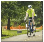  ??  ?? Max Grubb of Rogers starts his ride Wednesday on the Razorback Regional Greenway to Fayettevil­le from Horsebarn Trailhead Park in Rogers. Go to nwaonline.com/200614Dail­y/ to see more photos.