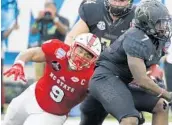  ?? ROGELIO V. SOLIS/ASSOCIATED PRESS ?? NC State end Bradley Chubb, left, should anchor the Wolfpack’s formidable defense during the 2017 season.